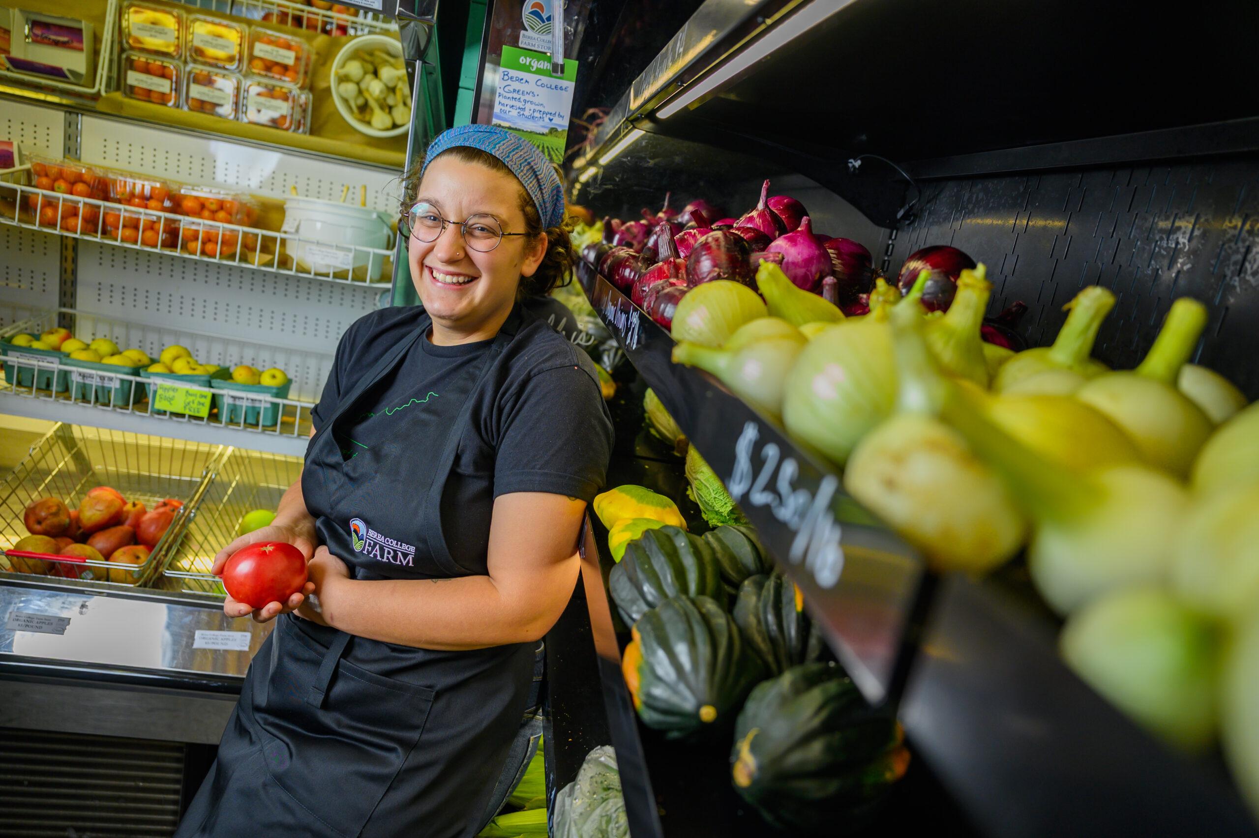 Loren Weber '21 working at the Farm Store